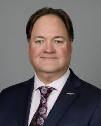 A head and shoulders portrait of Food Safety Icon, Dr Darin Detwiler