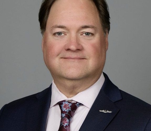 A head and shoulders portrait of Food Safety Icon, Dr Darin Detwiler