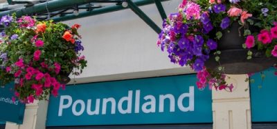 Front view of a Poundland store in the UK, showing its entrance and branded signage.