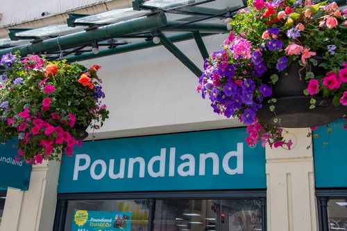 Front view of a Poundland store in the UK, showing its entrance and branded signage.